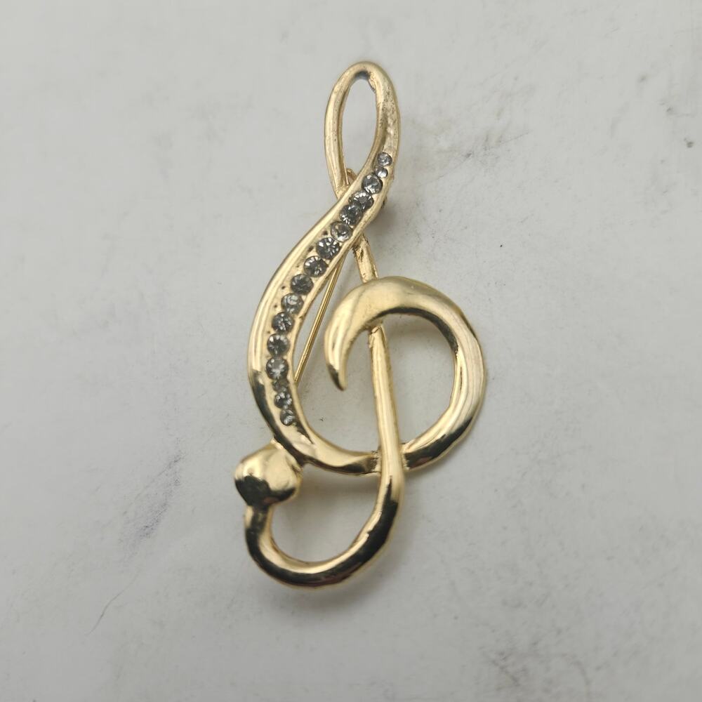 AAI Signed Gold Tone Clear Rhinestone Treble Clef Music Note Brooch Pin Jewelry